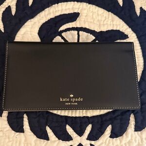 Kate Spade Black leather travel wallet.